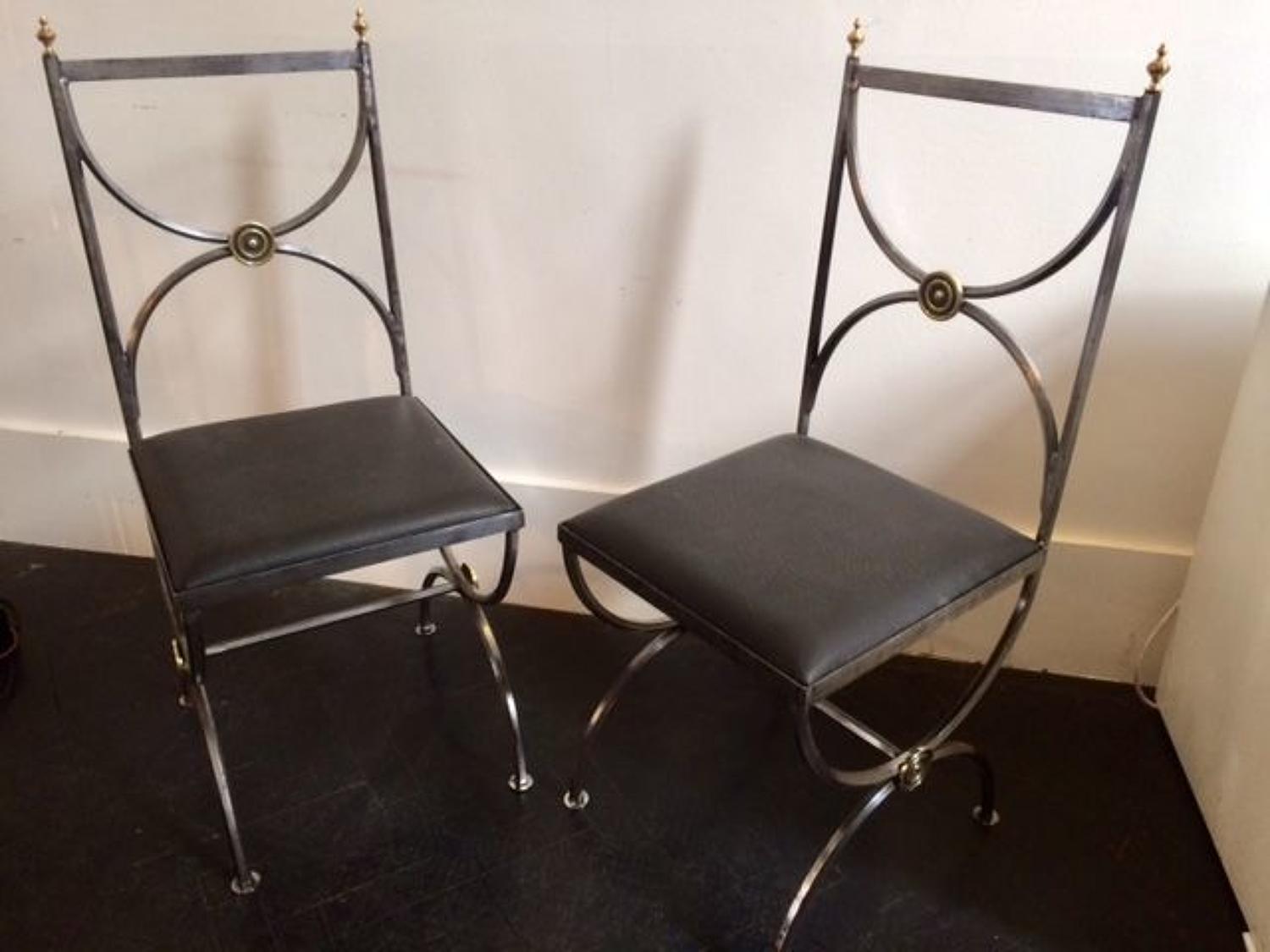 Pair of polished steel chairs
